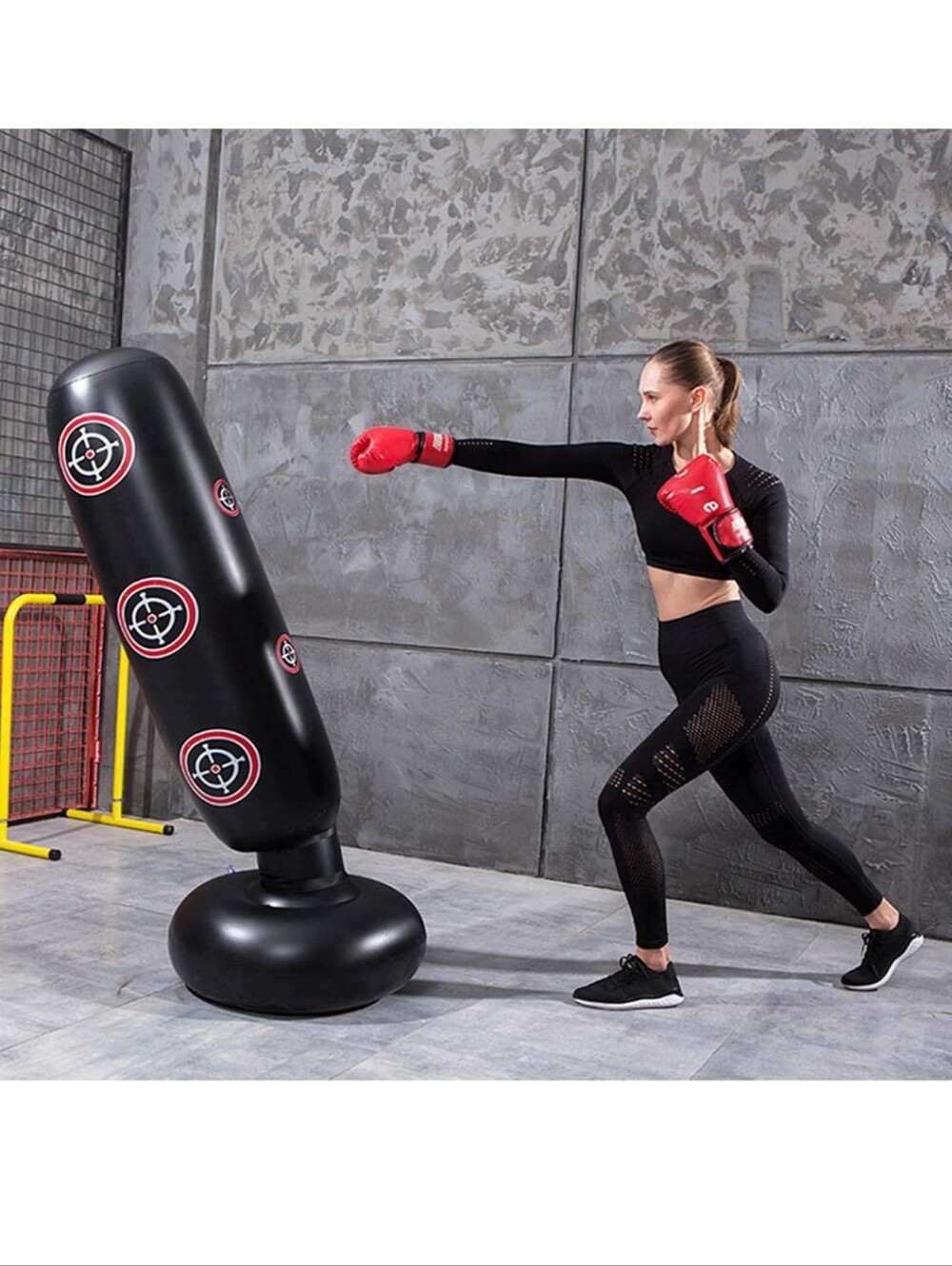 Freestanding Black Punching Bag with Red Target Accents